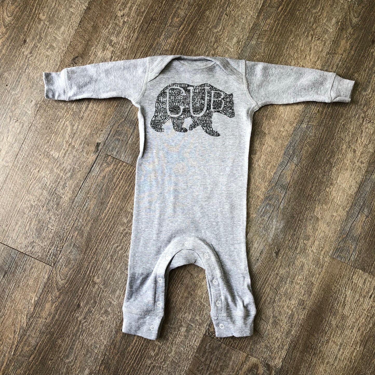 What's In A... KID - long sleeve romper